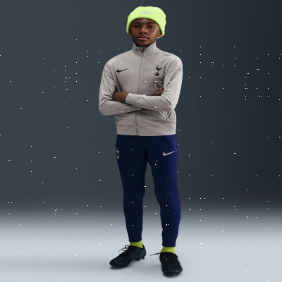 Recycled MaterialsTottenham Hotspur StrikeOlder Kids' Nike Dri-FIT Football Knit Tracksuit