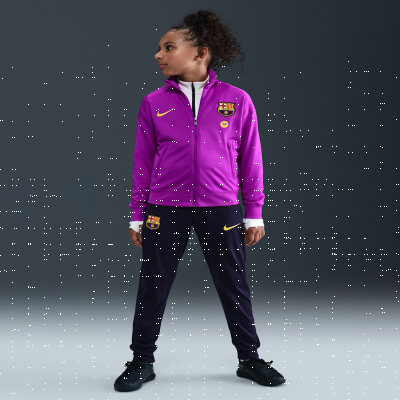 Recycled MaterialsF.C. Barcelona StrikeOlder Kids' Nike Dri-FIT Football Knit Tracksuit