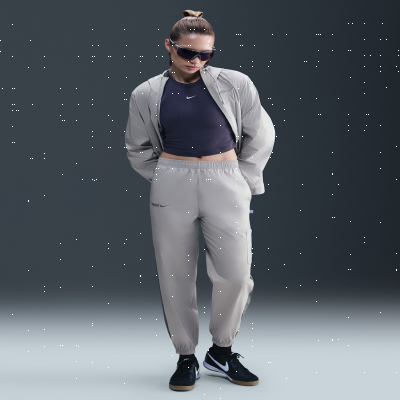 Recycled MaterialsFC Barcelona Essential RepelWomen's Nike Football Mid-Rise Woven Joggers